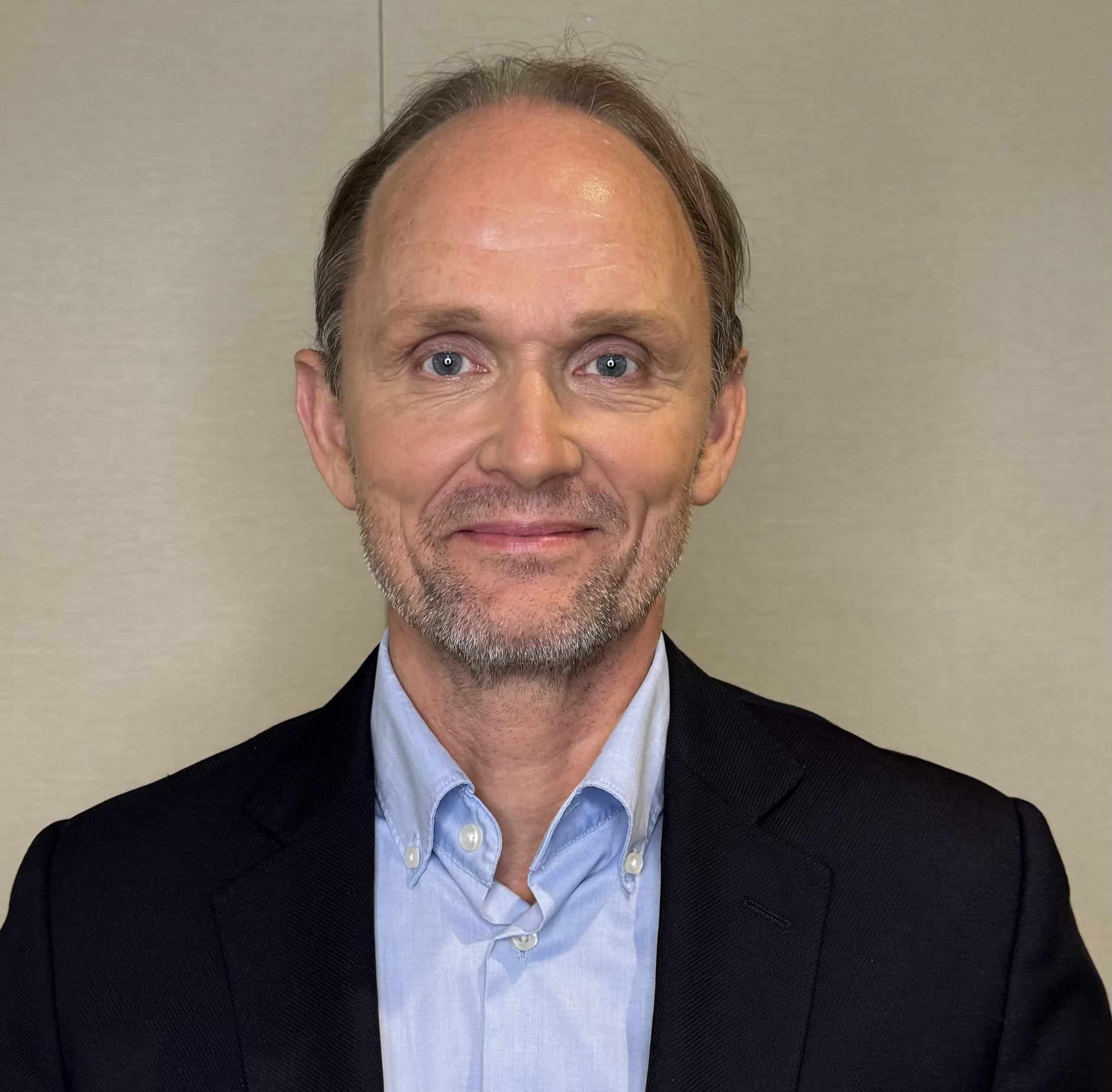 Portrait image of Johan Roos